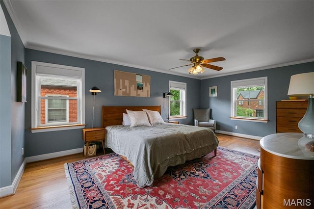 8140 Pershing Ave, Clayton, MO 63105 - bedroom with crown molding, wood finished floors, and a ceiling fan