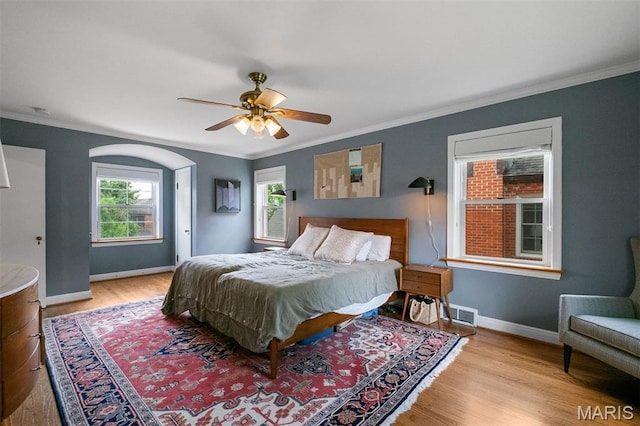 8140 Pershing Ave, Clayton, MO 63105 - bedroom featuring light wood-style flooring, ornamental molding, and ceiling fan