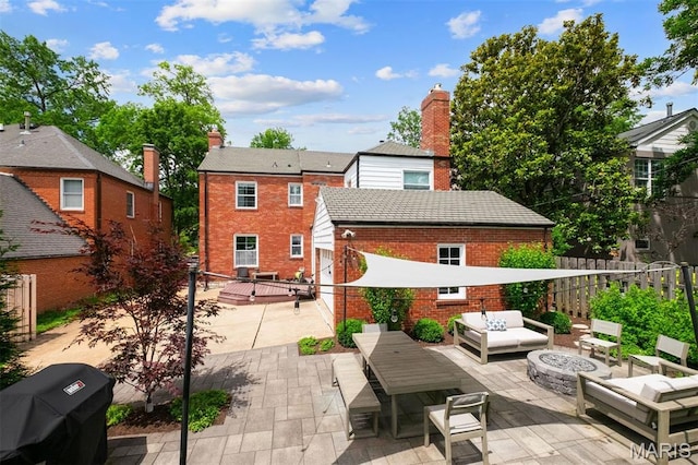 8140 Pershing Ave, Clayton, MO 63105 - view of patio featuring an outdoor living space with a fire pit