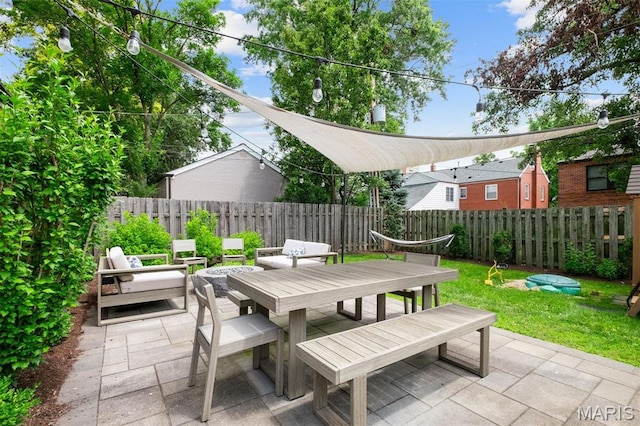 8140 Pershing Ave, Clayton, MO 63105 - fenced backyard with outdoor dining space and a patio