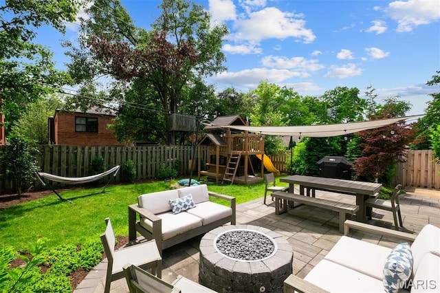 8140 Pershing Ave, Clayton, MO 63105 - fenced backyard featuring an outdoor living space with a fire pit, a patio area, a playground, and a grill