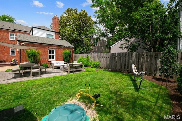 8140 Pershing Ave, Clayton, MO 63105 - fenced backyard with an outdoor living space and a patio area