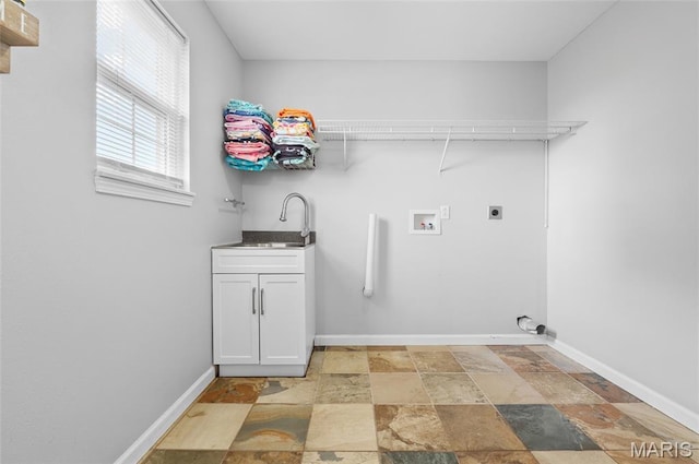 201 Mcclelland Dr, Troy, IL 62294 - laundry room featuring light stone finish floors, hookup for an electric dryer, hookup for a washing machine, cabinet space, and bar with sink