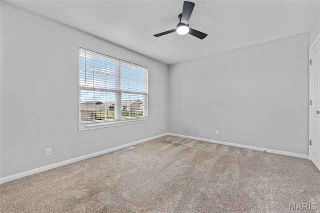 201 Mcclelland Dr, Troy, IL 62294 - carpeted spare room with baseboards and a ceiling fan