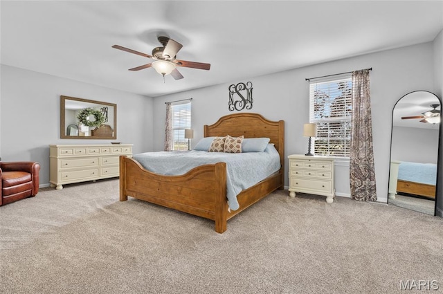 201 Mcclelland Dr, Troy, IL 62294 - carpeted bedroom featuring a ceiling fan and baseboards