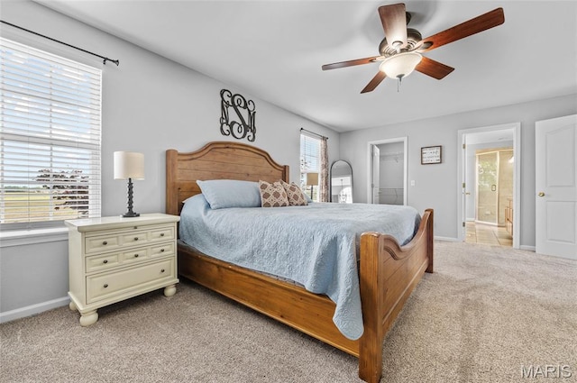 201 Mcclelland Dr, Troy, IL 62294 - bedroom with light colored carpet, a walk in closet, ceiling fan, and a closet