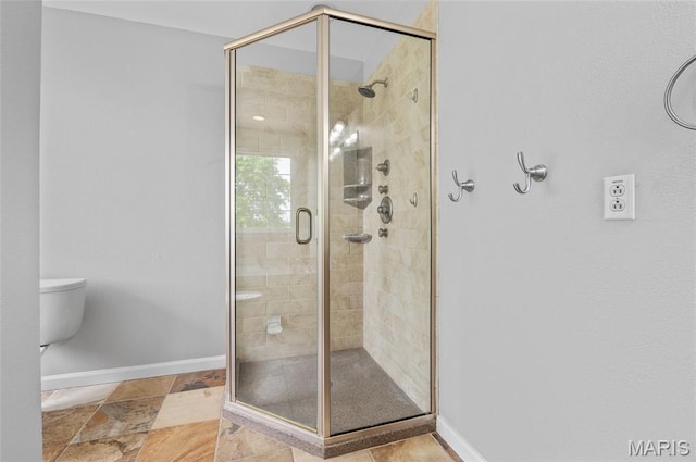 201 Mcclelland Dr, Troy, IL 62294 - bathroom featuring a shower stall and stone finish floors