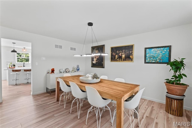 1549 Cascade Ln, Eureka, MO 63025 - dining space with light wood finished floors and baseboards