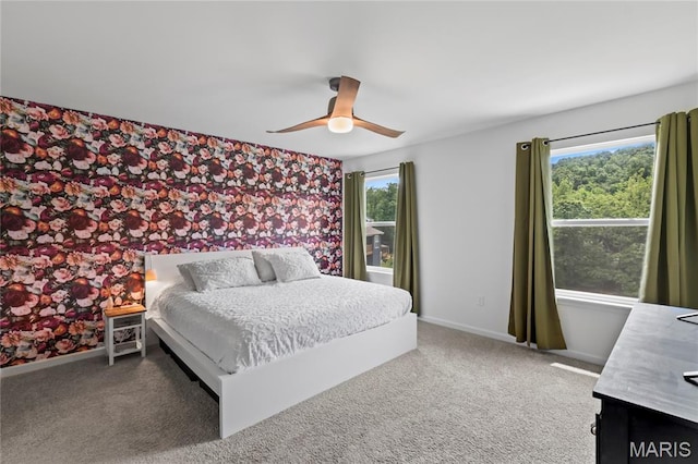 1549 Cascade Ln, Eureka, MO 63025 - carpeted bedroom with wallpapered walls, multiple windows, and a ceiling fan