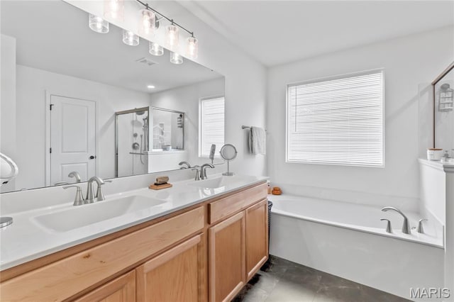1549 Cascade Ln, Eureka, MO 63025 - bathroom featuring a bath, a shower stall, and double vanity