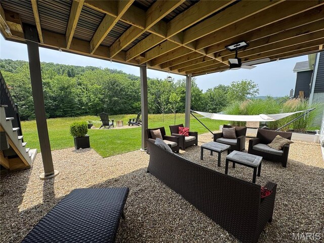 1549 Cascade Ln, Eureka, MO 63025 - view of patio featuring an outdoor living space and stairway