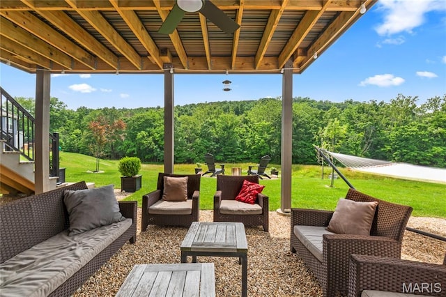1549 Cascade Ln, Eureka, MO 63025 - view of patio / terrace with outdoor lounge area, a wooded view, and a ceiling fan