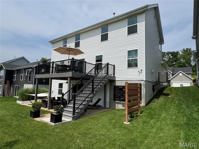 1549 Cascade Ln, Eureka, MO 63025 - rear view of house with a wooden deck, stairs, and a lawn