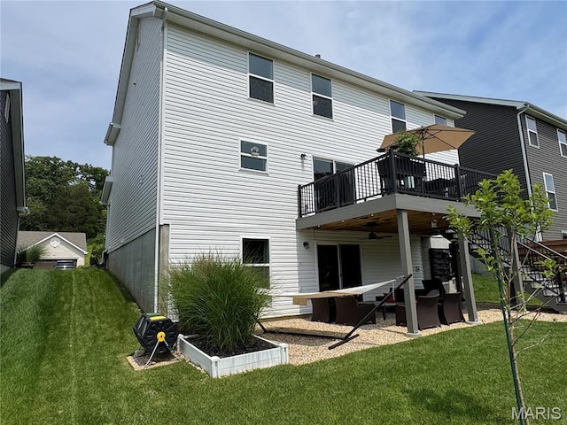 1549 Cascade Ln, Eureka, MO 63025 - back of house with a lawn, a patio, a deck, a ceiling fan, and stairway