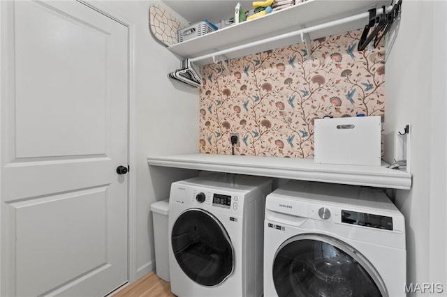 1549 Cascade Ln, Eureka, MO 63025 - laundry area with independent washer and dryer and light wood-style floors