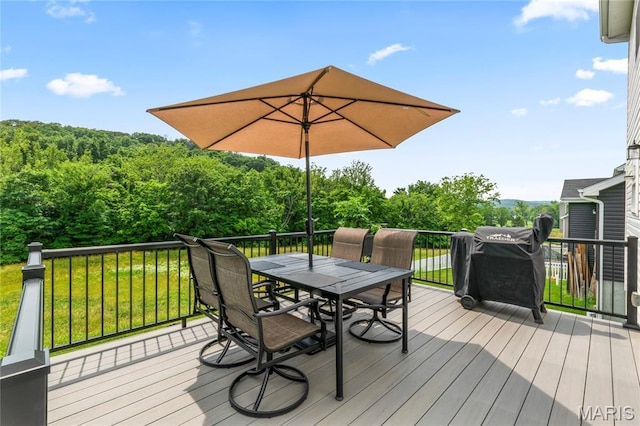 1549 Cascade Ln, Eureka, MO 63025 - wooden terrace featuring outdoor dining space and a yard