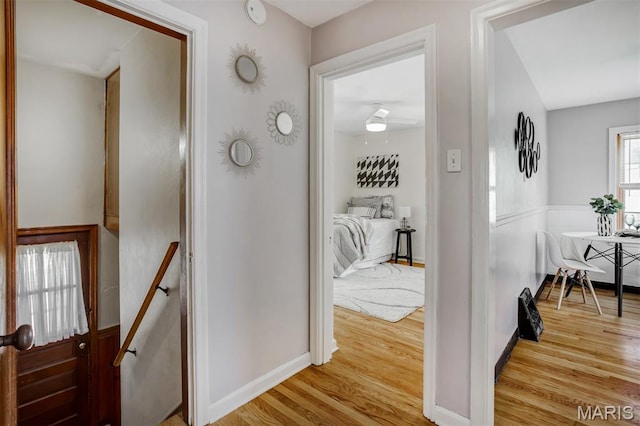 7041 Plainview Ave, Saint Louis, MO 63109 - hall featuring wood finished floors and an upstairs landing