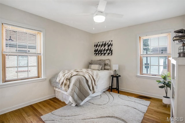 7041 Plainview Ave, Saint Louis, MO 63109 - bedroom with wood finished floors and a ceiling fan