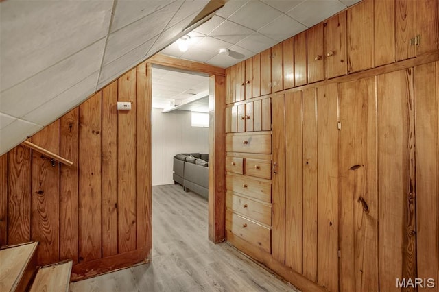 7041 Plainview Ave, Saint Louis, MO 63109 - additional living space featuring light wood-style flooring and wood walls