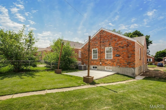 7041 Plainview Ave, Saint Louis, MO 63109 - back of property featuring a patio and brick siding
