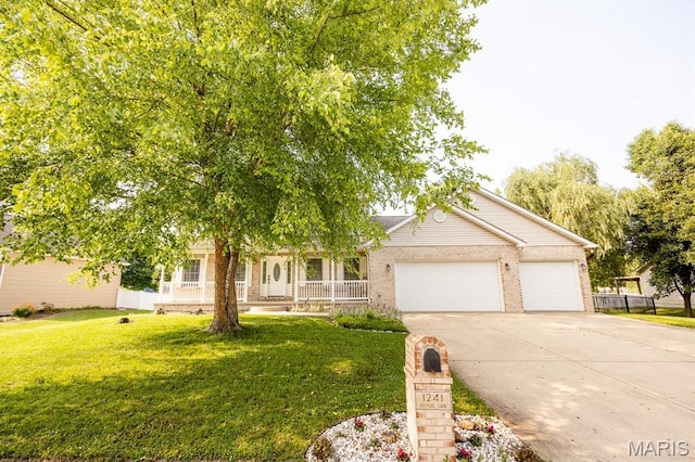 1241 Antique Ln, Mascoutah, IL 62258 - view of front of house with driveway, an attached garage, a front yard, a porch, and brick siding