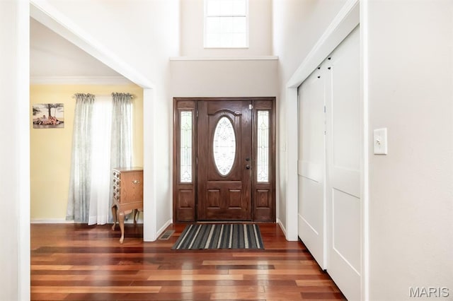 1241 Antique Ln, Mascoutah, IL 62258 - foyer entrance featuring hardwood / wood-style flooring, a high ceiling, and crown molding