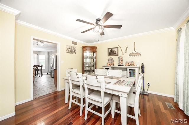 1241 Antique Ln, Mascoutah, IL 62258 - dining area with wood finished floors, crown molding, and a ceiling fan