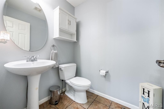 1241 Antique Ln, Mascoutah, IL 62258 - bathroom featuring toilet and tile patterned flooring