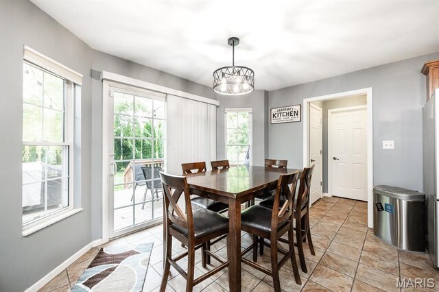 1241 Antique Ln, Mascoutah, IL 62258 - dining space with healthy amount of natural light and a chandelier