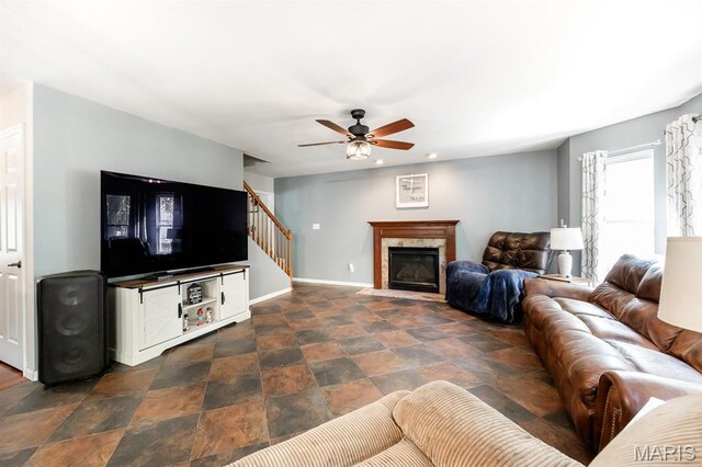 1241 Antique Ln, Mascoutah, IL 62258 - living area with ceiling fan, stairway, dark stone finish floors, a fireplace, and recessed lighting