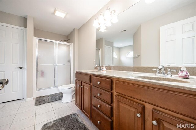1241 Antique Ln, Mascoutah, IL 62258 - bathroom with a stall shower, double vanity, and tile patterned floors