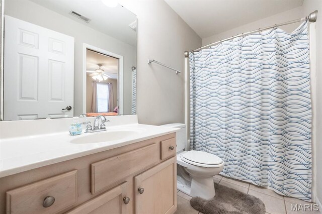 1241 Antique Ln, Mascoutah, IL 62258 - full bathroom with vanity, tile patterned flooring, a shower with shower curtain, and a ceiling fan