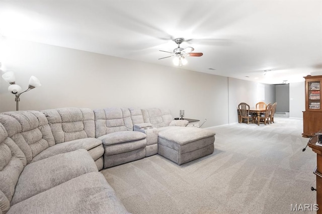 1241 Antique Ln, Mascoutah, IL 62258 - carpeted living area featuring a ceiling fan and baseboards