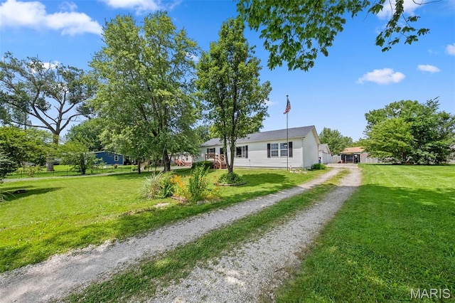 44 Viola Dr, Wright City, MO 63390 - view of front facade with driveway and a front lawn