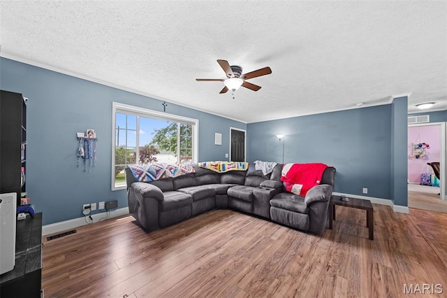 44 Viola Dr, Wright City, MO 63390 - living area featuring ceiling fan, a textured ceiling, and wood finished floors