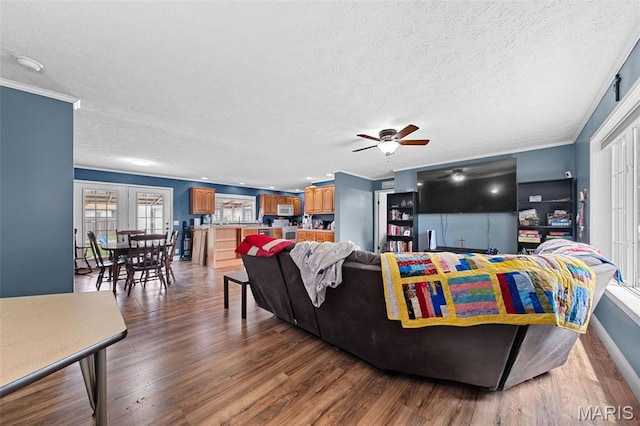 44 Viola Dr, Wright City, MO 63390 - living room with a textured ceiling, wood finished floors, a ceiling fan, and ornamental molding