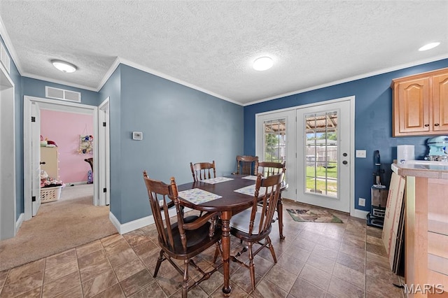 44 Viola Dr, Wright City, MO 63390 - dining area featuring ornamental molding, a textured ceiling, carpet, and french doors