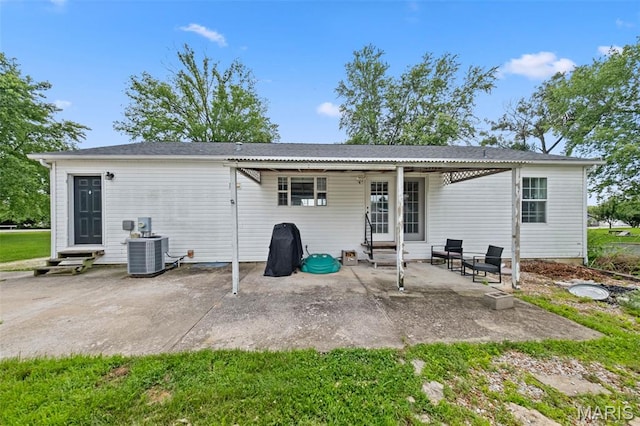 44 Viola Dr, Wright City, MO 63390 - rear view of house featuring entry steps and a patio area