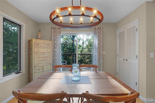 877 Red Fox Dr, Innsbrook, MO 63390 - dining room featuring a chandelier and baseboards