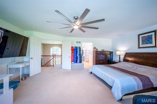 824 Legends View Dr, Eureka, MO 63025 - carpeted bedroom featuring connected bathroom and ceiling fan