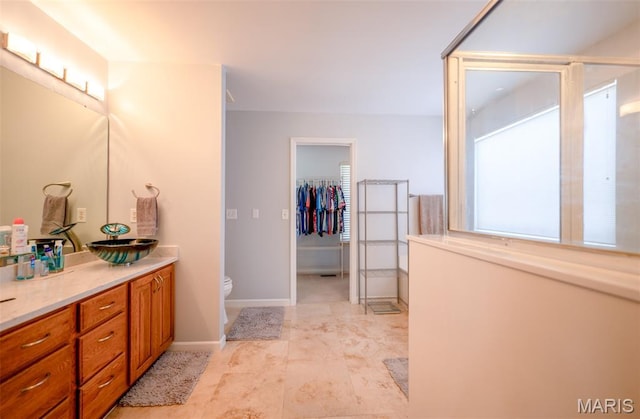 824 Legends View Dr, Eureka, MO 63025 - bathroom with vanity and a walk in closet