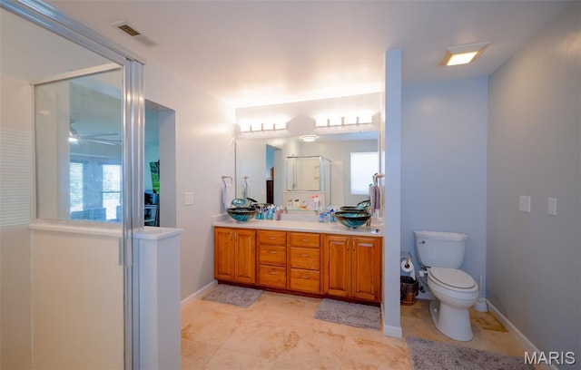 824 Legends View Dr, Eureka, MO 63025 - full bath featuring vanity, plenty of natural light, an enclosed shower, and a ceiling fan