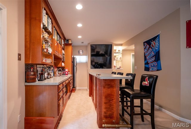 824 Legends View Dr, Eureka, MO 63025 - indoor dry bar with light colored carpet and recessed lighting