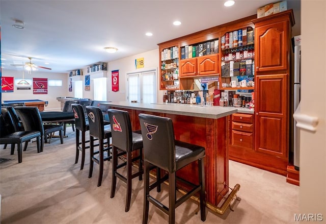 824 Legends View Dr, Eureka, MO 63025 - indoor dry bar featuring light colored carpet, healthy amount of natural light, ceiling fan, and recessed lighting