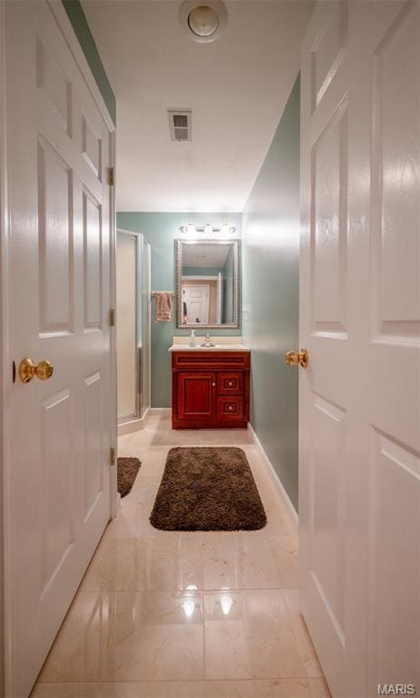 824 Legends View Dr, Eureka, MO 63025 - full bathroom featuring vanity, a stall shower, and marble finish flooring