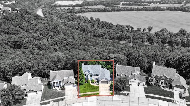 824 Legends View Dr, Eureka, MO 63025 - aerial view of residential area featuring a forest and property parcel outlined