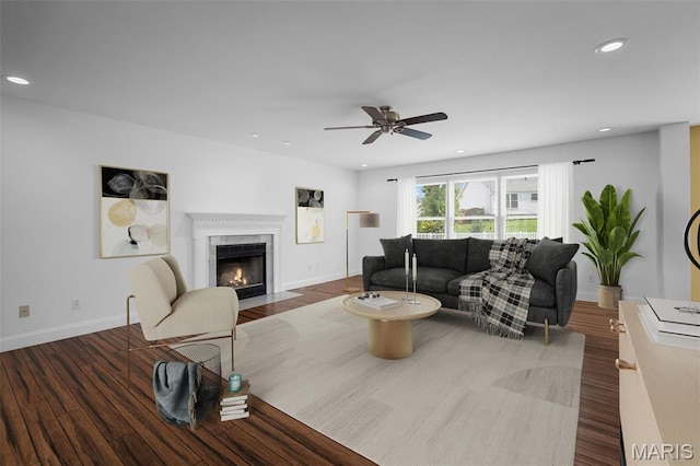 8 Dugout Ct, Ofallon, MO 63366 - living room featuring recessed lighting, wood finished floors, a premium fireplace, and ceiling fan