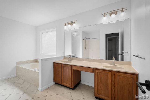 8 Dugout Ct, Ofallon, MO 63366 - full bathroom featuring a bath, double vanity, and tile patterned flooring