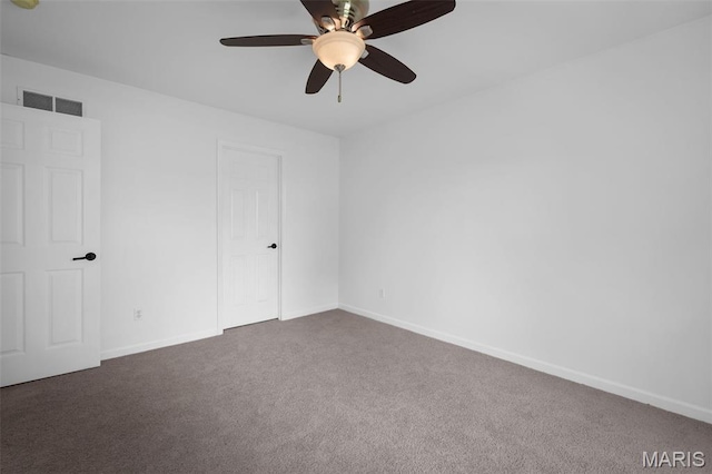 8 Dugout Ct, Ofallon, MO 63366 - unfurnished bedroom with dark carpet and ceiling fan