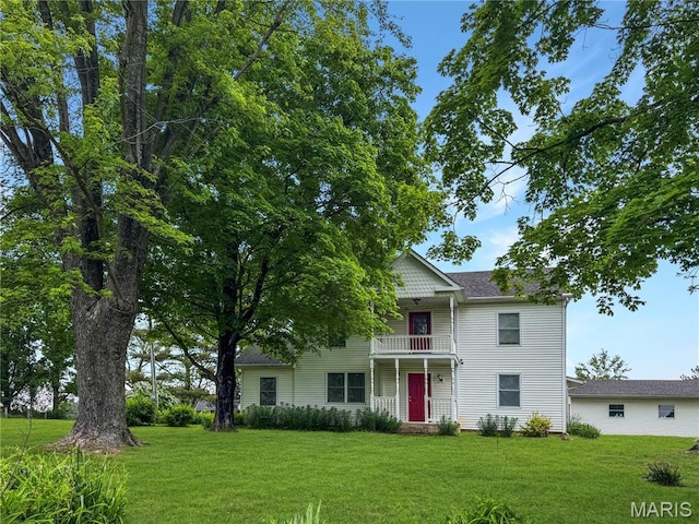 4423 Project Rd, Luebbering, MO 63061 - view of front of house with a balcony and a front lawn